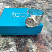 Load image into Gallery viewer, Spiral shell silver textured adjustable ring