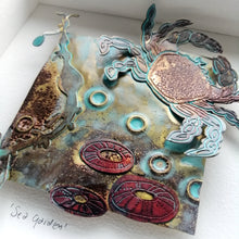 Load image into Gallery viewer, Sea garden picture with crab, seaweed, limpet metalwork handmade by Sharon McSwiney