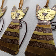 Load image into Gallery viewer, Striped brass cat decorations handmade by Sharon McSwiney