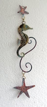 Load image into Gallery viewer, brass seahorse with starfish wall hanging handmade by Sharon McSwiney