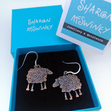 Load image into Gallery viewer, swirly sheep drop earrings in a copper finish handmade by Sharon McSwiney in a gift box
