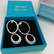 Load image into Gallery viewer, Porthmeor limpet shell earrings with hammered silver loop handmade by Sharon McSwiney in a gift box