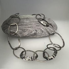 Load image into Gallery viewer, Loopy limpet oxidised necklace pendant