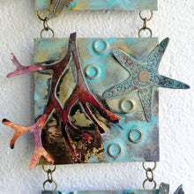 Load image into Gallery viewer, Metalwork wall panel with 3 sections featuring seaweed &amp; starfish handmade by Sharon McSwiney
