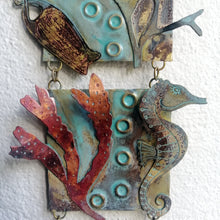 Load image into Gallery viewer, Metalwork wall panel with 3 sections featuring seaweed, a seahorse & mermaids purse handmade by Sharon McSwiney