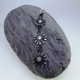 Triple daisy oxidised silver necklace