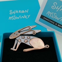 Load image into Gallery viewer, Copper coloured hare brooch with stars on its body handmade by Sharon McSwiney in a gift box
