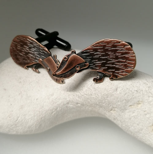 Badger cuff links in a copper finish handmade by Sharon McSwiney