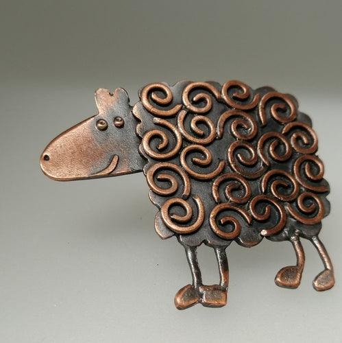 copper coloured sheep brooch with swirly pattern handmade by Sharon McSwiney
