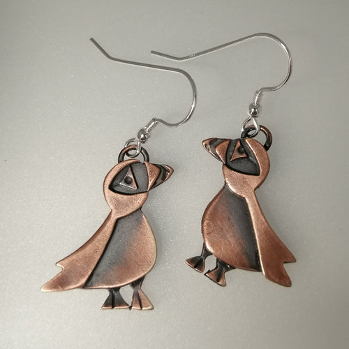 puffin drop earrings in a copper finish handmade by Sharon McSwiney