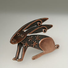 Load image into Gallery viewer, Copper coloured hare brooch with stars on its body handmade by Sharon McSwiney
