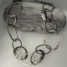 Load image into Gallery viewer, Loopy limpet oxidised necklace pendant
