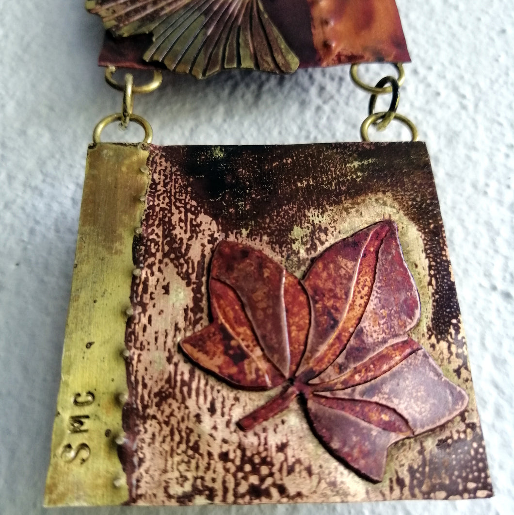 Mini metalwork panel with leaf decorations in copper & brass handmade by Sharon McSwiney