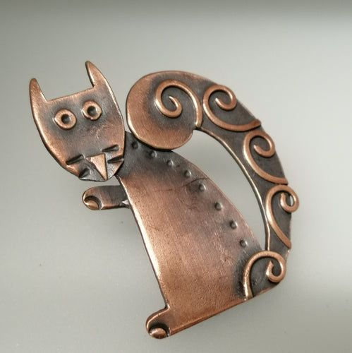 Squirrel brooch in a copper finish handmade by Sharon McSwiney