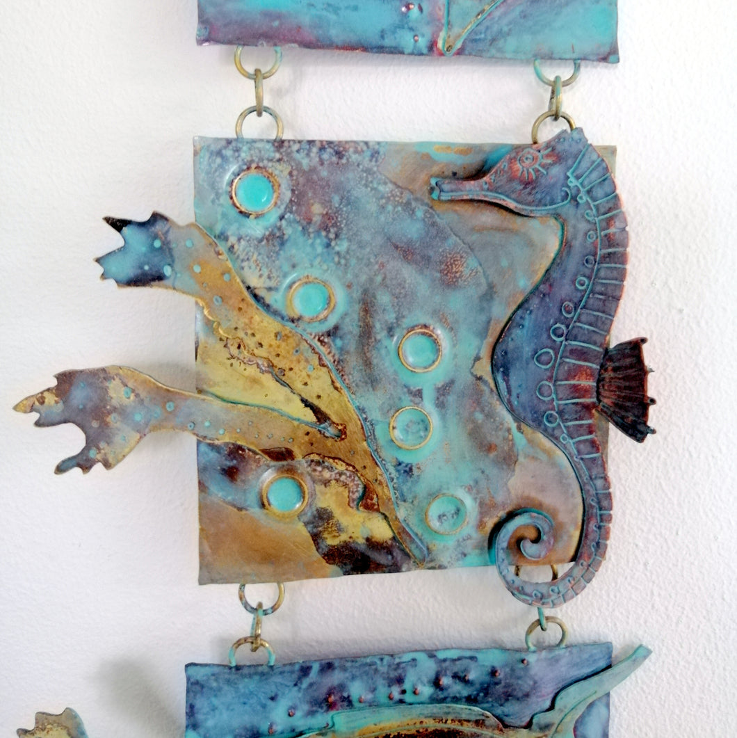 Metalwork long wall panel in copper & brass featuring seahorse with seaweed handmade by Sharon McSwiney