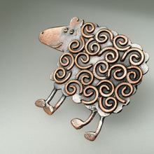 Load image into Gallery viewer, copper coloured sheep brooch with swirly pattern handmade by Sharon McSwiney
