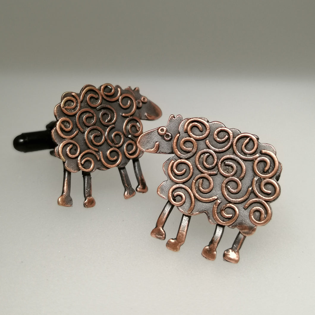 Sheep cuff links in a copper finish handmade by Sharon McSwiney